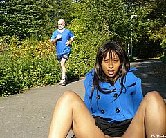 Ebony teen babe Candy masturbating and pussy flashing in public outdoors with hairy chicka from UK Flashers